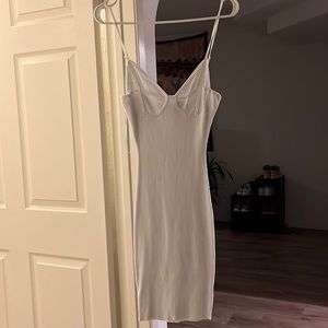 White dress. Very comfortable.Size Large but I wear a medium and it fits perfect